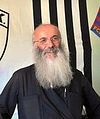 Greek priest is a huge soccer fan