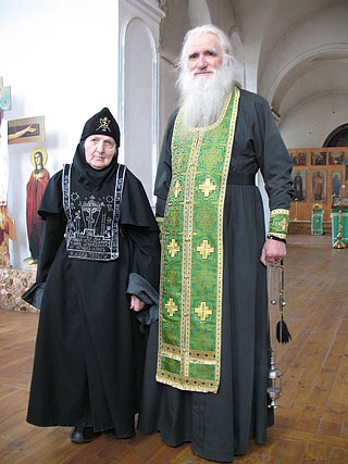 Archimandrite Athanasius and his mother, a schemanun at the convent.