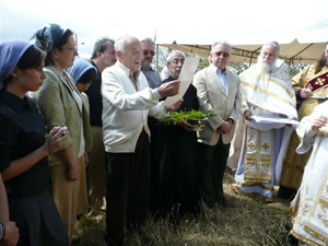Placing the first stone in the foundation of the Vladimir Mother of God Church.