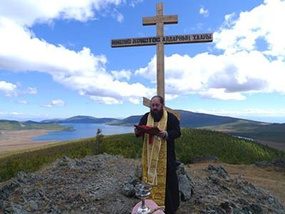 Cross erected on 2100 meter peak in Tuva