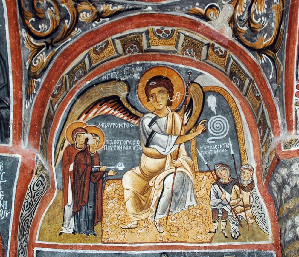 The myrrh-bearing women and angel on the tomb. Fresco in a cave church in Cappadocia.6th c.