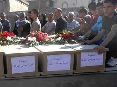 Массовые захоронения обнаружены в освобожденной христианской деревне в Сирии 
