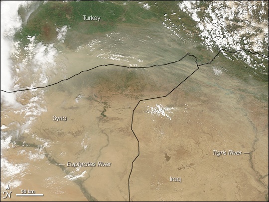 In this 2010 NASA satellite image, vast dust storms can be seen dispersing the light soils of Syria. (NASA)