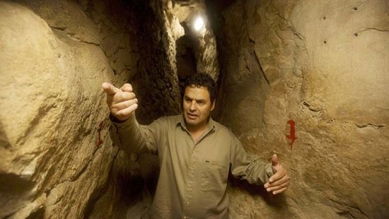 Eli Shukron, an archeologist formerly with Israel's Antiquities Authority, walks in the City of David archaeological site near Jerusalem's Old City. The dig, which began in 1995, uncovered a massive fortification and pottery shards that date to 3,800 years ago. Shukron says this is the legendary citadel captured by King David in his conquest of Jerusalem. But archaeologists are divided on identifying Davidic sites in Jerusalem, the city he is said to have made his capital. (AP Photo/Sebastian Scheiner)