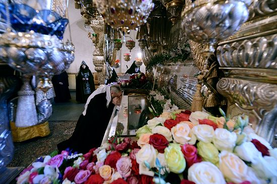 Patriarch Kirill at the relics of St. Matrona of Moscow in the Protection Monastery, Moscow, where they rest today.