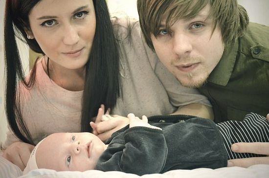 Igor Kapranov with wife and child.