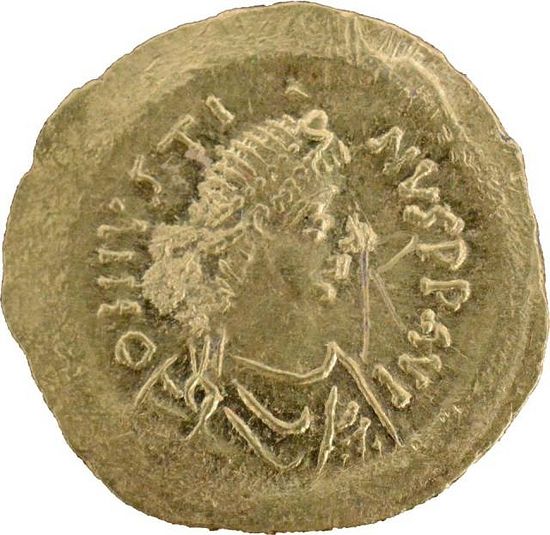 This newly found gold coin of Byzantine Emperor Justine I (r. 518-527 AD) was minted to pay for the construction of the Early Byzantine Fortress in Agathopolis but was never in use, according to the archaeologists. Photo: Tsarevo Municipality Facebook Page