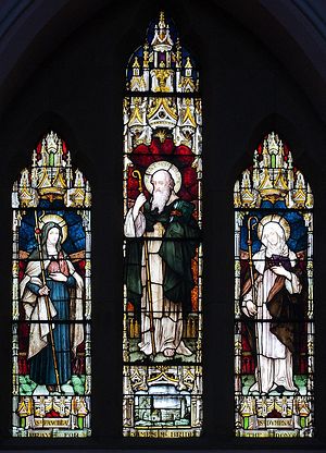 A stained glass depicting St. Fanchia with two other saints - Molaise and Dymphna