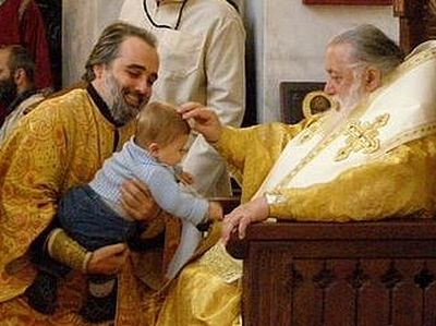 Patriarch Ilia II baptizes another 1,173 children
