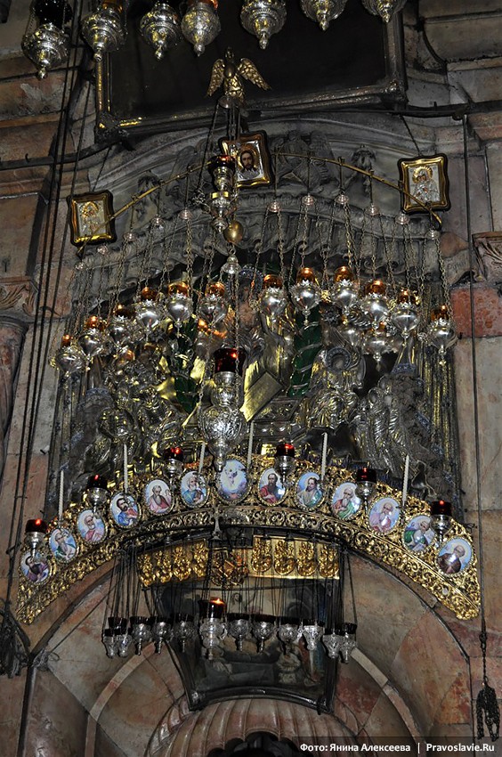 The Church of the Lord’s Sepulcher. Icons and lampadas over the entrance to the Tomb.
