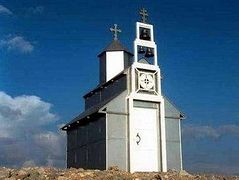 Ethnic Albanians demand removal of church