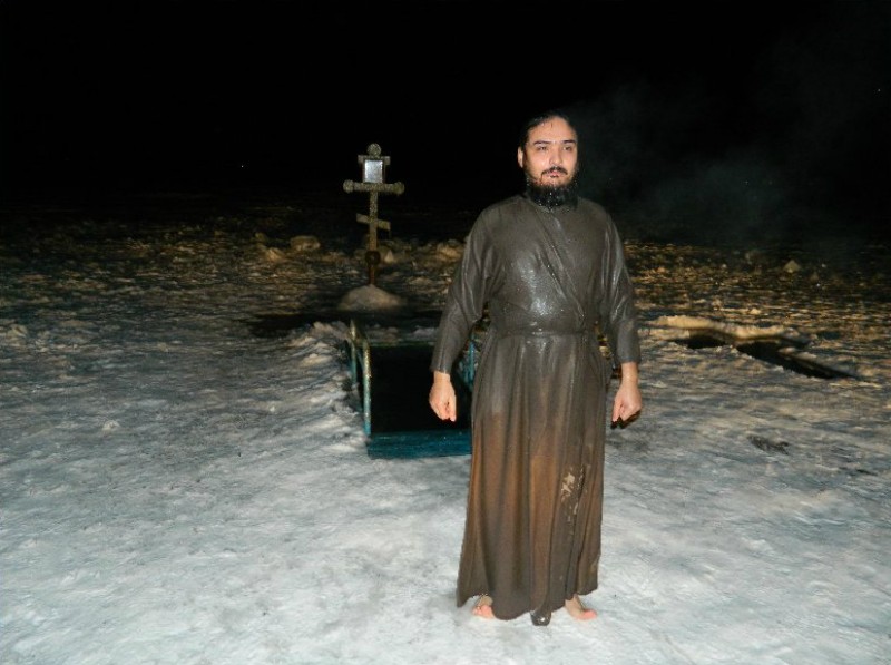 Lake Balkhash, Kazakhstan: a priest right after immersing in an ice-hole (“prorub”).