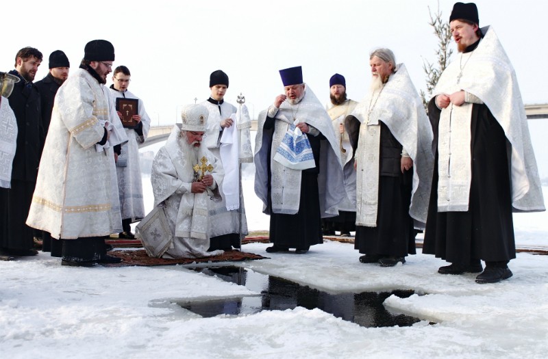 The Great Blessing of the Waters on the Volga River is being performed by late Archbishop Alexis (Frolov) of Kostroma.
