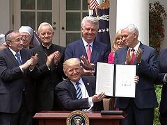 Trump signs religious freedom order that leaves many unsatisfied