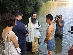 Chinese man travels thousands of miles to be baptized