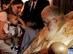 Patriarch Ilia celebrates 50th mass Baptism