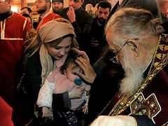 Patriarch Ilia baptizes another 600+ Godchildren