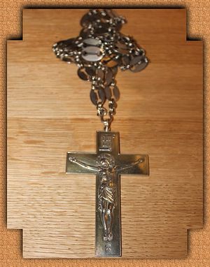 Наперсный крест царских времён с вензелем императора Павла, подаренный игуменом одного монастыря.