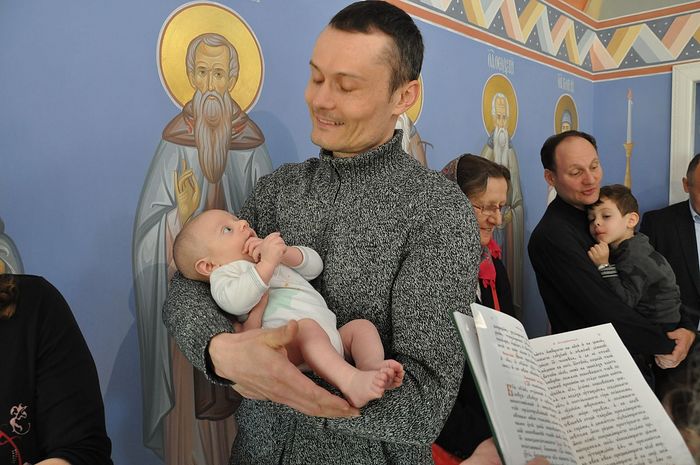 Sergei Botvinov, the godfather, with his godchild.