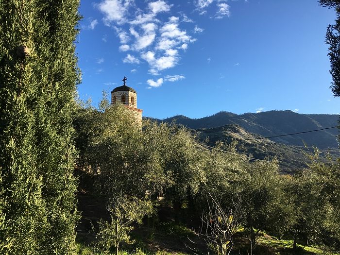 The Convent of the Life-Giving Spring amid the mountains.
