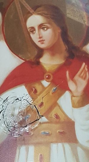Икона «Чудо Архангела Михаила в Хонех» со следом от пули. Фото: Александр Егорцев