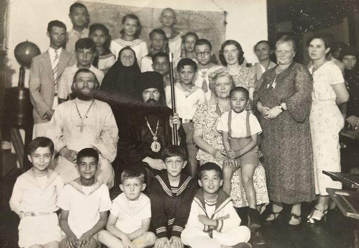 Vladyka John with parishioners. Benya is in the lower row in the center.