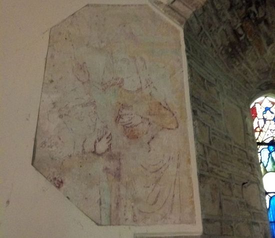 A wall painting of St. Morwenna praying over a monk inside Morwenstow church, Cornwall (photo provided by the assistant curate of Morwenstow)
