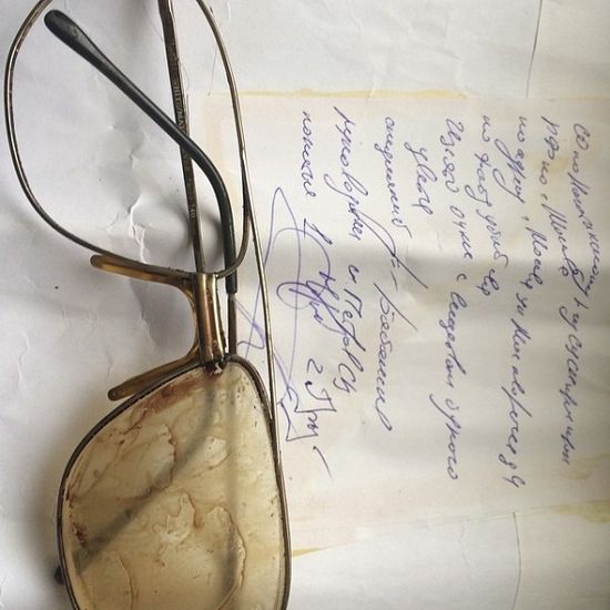 Fr. Daniel’s bloodstained glasses and the envelope from SKP