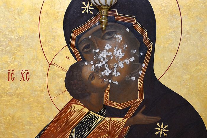 The Vladimir icon of the Theotokos shot at by a neo-pagan in the cathedral of Yuzhno-Sakhalinsk in 2014. Photo by Anton Pospelov / Pravoslavie.ru
