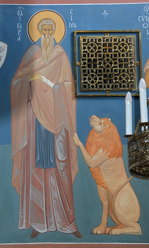 A fresco of St. Gerasimus of the Jordan and his lion.