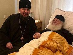 Schismatic head Epiphany Dumenko visits Abbot Ephraim of Vatopedi in hospital