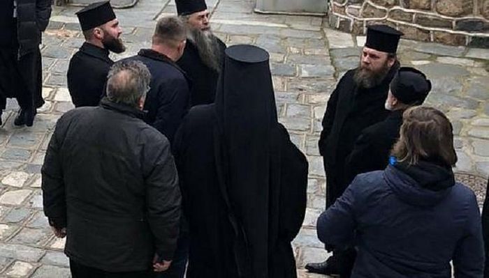 The delegation waiting outside St. Panteleimon's Monastery