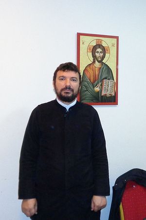 Priest Gregory Pelushi