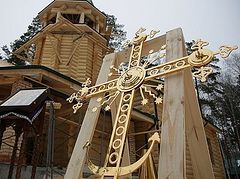 Cross blessed and erected on restored church at Royal Passion-Bearers Monastery in Ganina Yama