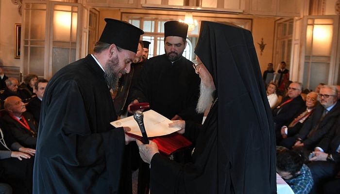 Archimandrite Epiphanius with Patriarch Bartholomew. Photo: iellada.gr