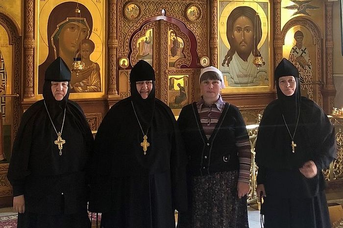 At Optina Hermitage. Abbess Nikolaya of St. Nicholas Monastery (center) with her spiritual children: Abbess Makaria (right), Abbess Theodosia (left), and author Olga Rozhneva