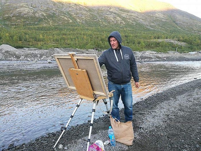 Artist Vasily Kursaksa at work
