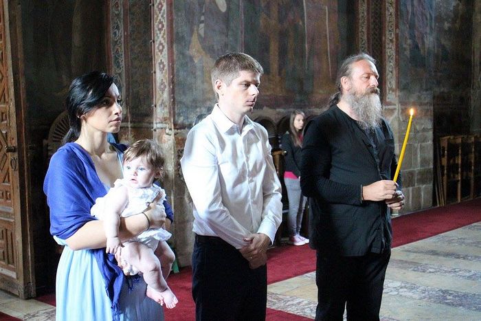 During daughter’s baptism at the Visoki Dečani monastery.