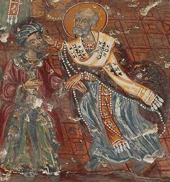 St. Nicholas of Myra in Lycia slaps the heretic Arius in the face during the First Ecumenical Council, accusing Him of falsehood.