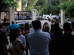 Greek faithful protest closing of churches at Synodal headquarters in Athens