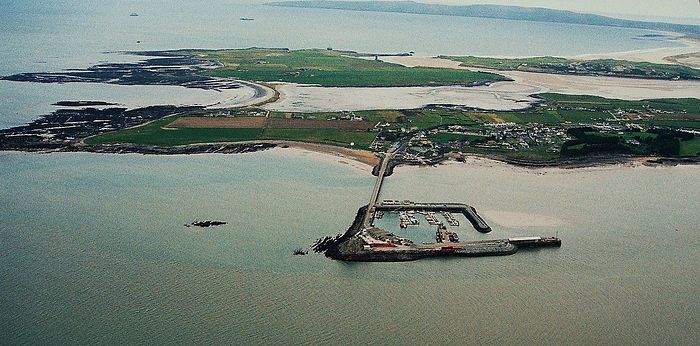 Fenit, St. Brendan's birthplace, with the harbor and island (taken from Wikipedia)