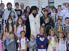 Children from needy families receive school supplies from Ukrainian Church