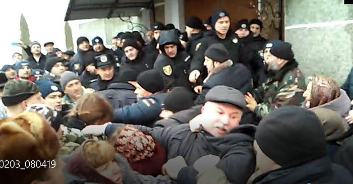 A scene from a church seizure. Photo: news.church.ua