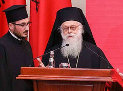 Archbishop Anastasios accepts national medal for fostering peace on behalf of Inter-Religious Council