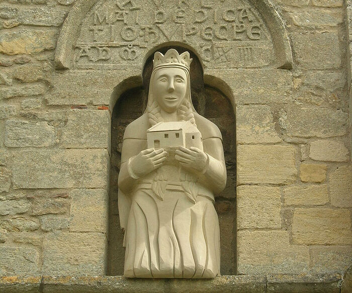 St. Cyneburgh's stone statue by Mark Sharpin at the church of Castor, Cambs (provided by Dr. Avril Lumley-Prior)
