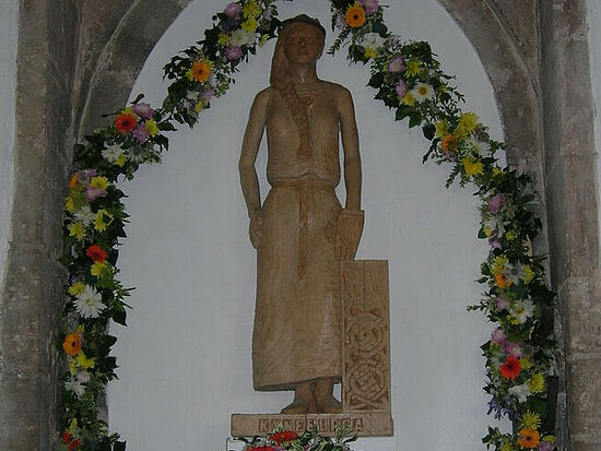St. Cyneburgh's wooden statue by Kevin Daley at the church of Castor, Cambs (provided by Dr. Avril Lumley-Prior)