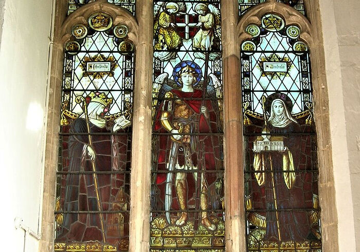 St. Etheldreda, the Archangel Michael and St. Wendreda (from left to right) on a window at the church in March (provided by Dr. Avril Lumley-Prior)