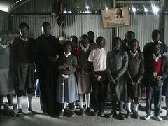 Orthodox priest attends local meeting on education reforms in Kenya