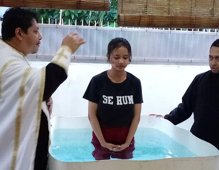 Βάφτιση μιας κατηχούμενης