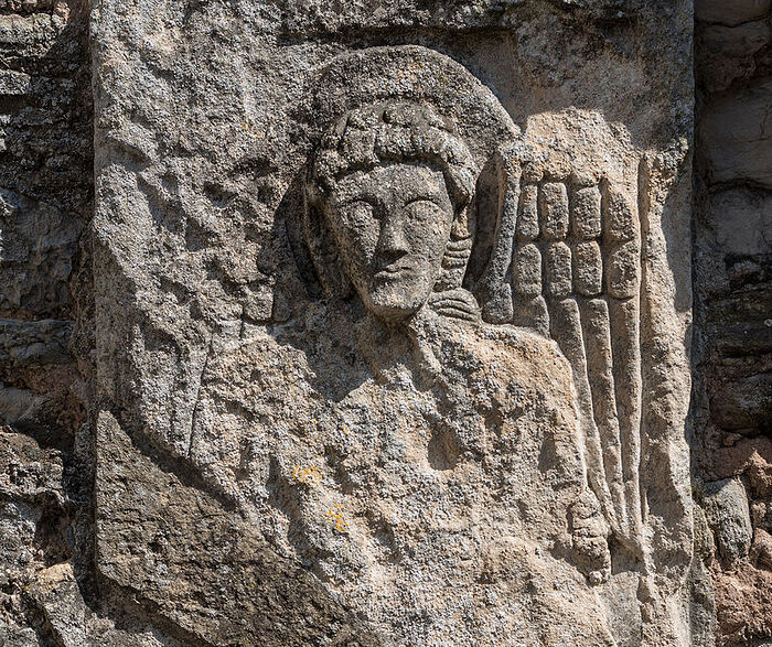 Carving of the angel on the exterior wall of the ruined apse of Deerhurst church (picture is the copyright of Deerhurst Parochial Council)